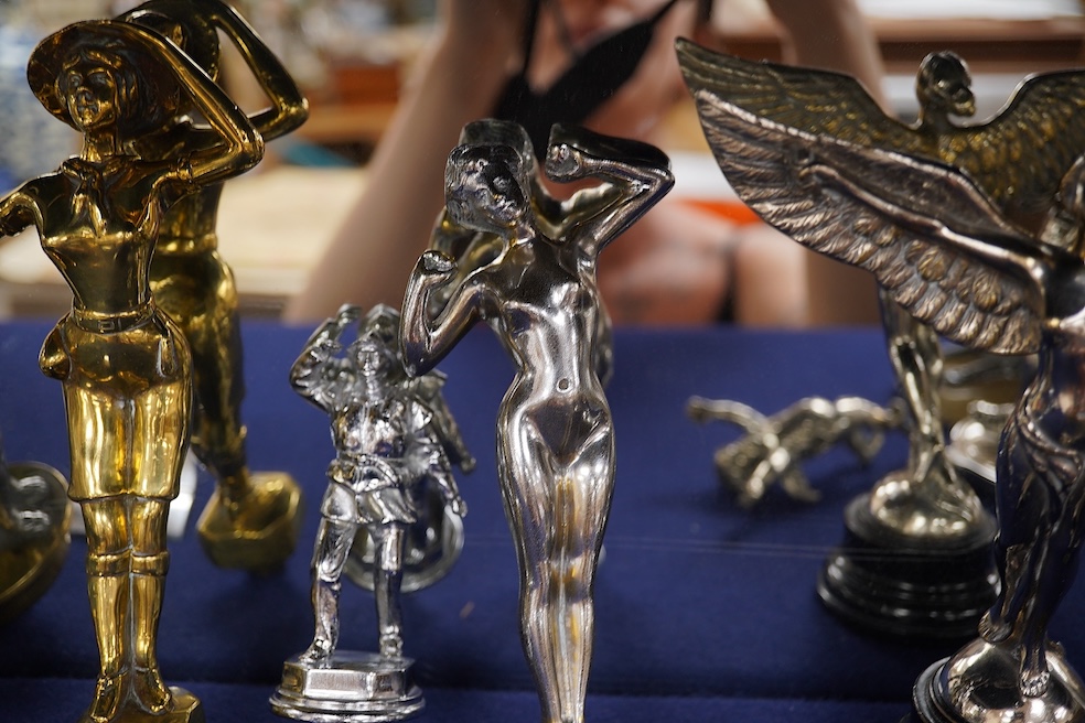 Eight figural chrome and brass car mascots, etc. including a knight in full armour mounted on a threaded radiator cap, a sphinx mounted on a threaded radiator cap, plus an additional sphinx mounted on an alabaster plinth